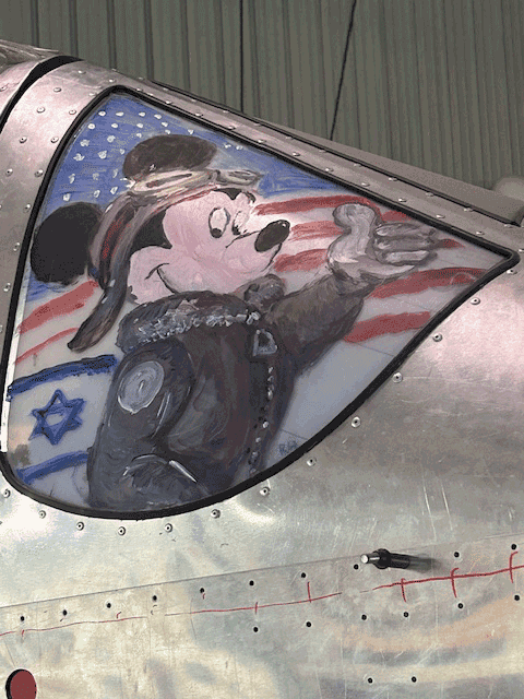 Artwork Applied to Aircraft Cockpit Section