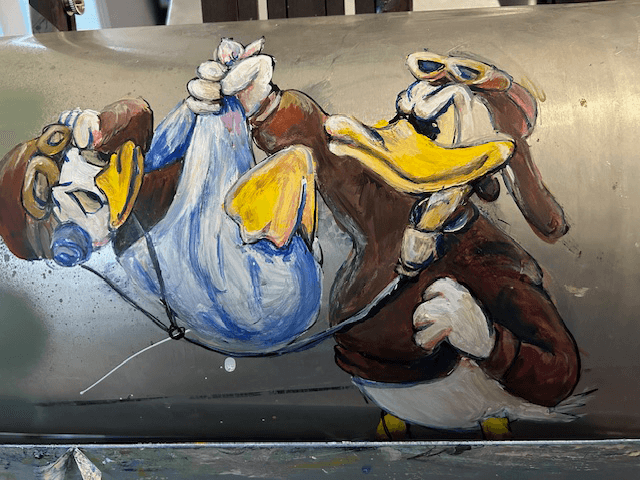 Donald Duck Fighter Insignia on WWII Aircraft Side Panel